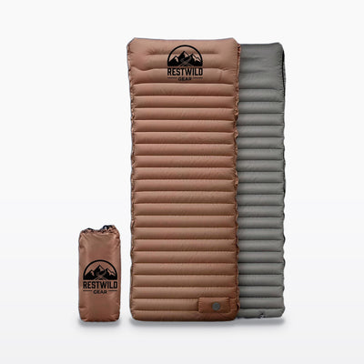 Brown Restwild Mattress Pro V2 sleeping pad with its gray underside and brown stuff sack